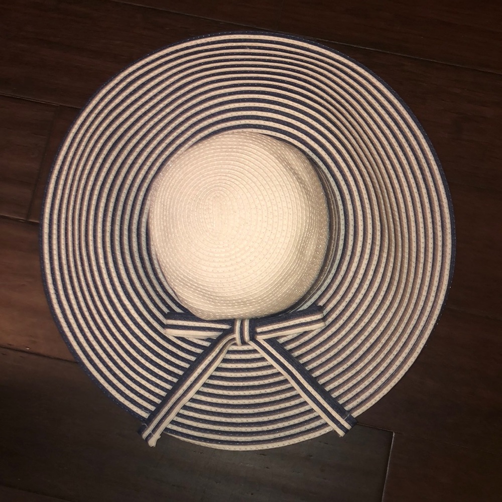 Navy and white hat with bow / Carnival cruise line